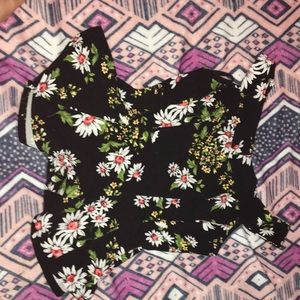 A flower off the shoulder shirt